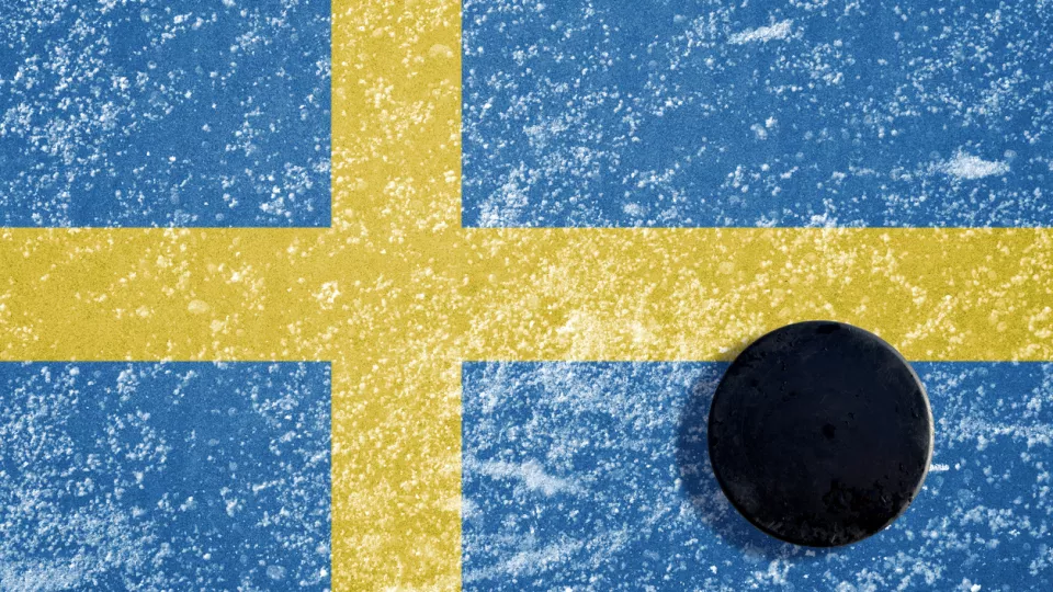 Swedish flag with a hockey puck. Photo: iStock