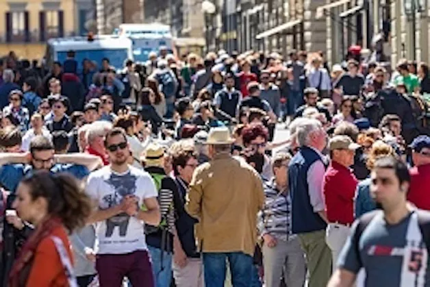 Crowd in the street. Photo.
